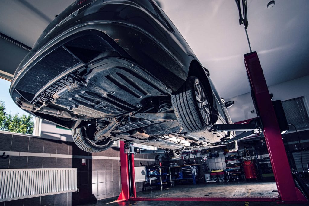 lifted-car-in-garage